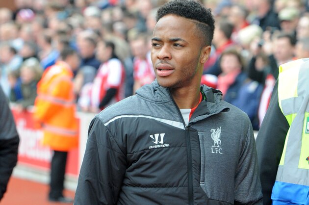 Liverpool's Raheem Sterling makes his way to the bench as a substitute during the English Premier League soccer match between Stoke City and Liverpool at the Britannia Stadium, Stoke on Trent, England, Sunday, May 24, 2015. (AP Photo/Rui Vieira)