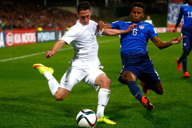 AUCKLAND, NEW ZEALAND - JUNE 02: Joel Stevens of New Zealand is tackled by Kellyn Parry-Acosta of the USA during the FIFA U-20 World Cup New Zealand 2015 Group A match between New Zealand and the United States at North Harbour Stadium on June 2, 2015 in Auckland, New Zealand. (Photo by Phil Walter/Getty Images) AUCKLAND, NEW ZEALAND - JUNE 02: Joel Stevens of New Zealand is tackled by Kellyn Parry-Acosta of the USA during the FIFA U-20 World Cup New Zealand 2015 Group A match between New Zealand and the United States at North Harbour Stadium on June 2, 2015 in Auckland, New Zealand. (Photo by Phil Walter/Getty Images)