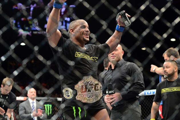 May 23, 2015; Las Vegas, NV, USA;  Daniel Cormier  celebrates after defeating Anthony Johnson (not pictured) in their light heavyweight championship bout during UFC 187 at MGM Grand Garden Arena. Cormier won via third round TKO. Mandatory Credit: Joe Camporeale-USA TODAY Sports