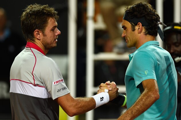 ROME, ITALY - MAY 16:  Stan Wawrinka of Switzerland greets his compatriot Roger Federer at the net after their Men's Semi Final on Day Seven of The Internazionali BNL d'Italia 2015 at the Foro Italico on May 16, 2015 in Rome, Italy.  (Photo by Mike Hewitt/Getty Images)