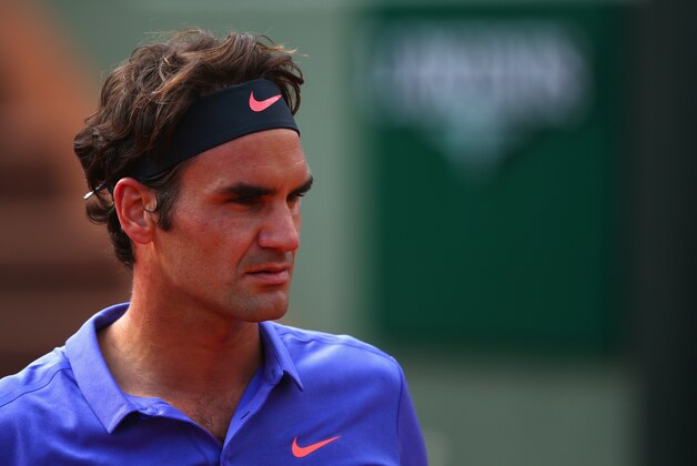 PARIS, FRANCE - JUNE 02:  Roger Federer of Switzerland looks on in his Men's quarter final match against Stanislas Wawrinka of Switzerland on day of the 2015 French Open at Roland Garros on June 2, 2015 in Paris, France.  (Photo by Clive Brunskill/Getty Images)