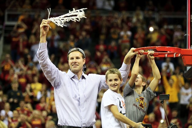 KANSAS CITY, MO - MARCH 14:  Head coach Fred Hoiberg of the Iowa State Cyclones cuts down a piece of the net after their 70 to 66 victory over the Kansas Jayhawks during the championship game of the Big 12 Basketball Tournament at Sprint Center on March 14, 2015 in Kansas City, Missouri.  (Photo by Jamie Squire/Getty Images)