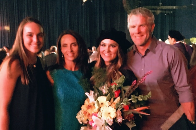 Packers legend Brett Favre (right) poses with (from left) daughter Breleigh, wife Deanna and daughter Brittany at Brittany's law school graduation ceremony last month.