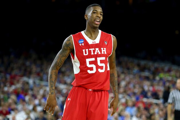 HOUSTON, TX - MARCH 27: Delon Wright #55 of the Utah Utes reacts against the Duke Blue Devils during a South Regional Semifinal game of the 2015 NCAA Men's Basketball Tournament at NRG Stadium on March 27, 2015 in Houston, Texas.  (Photo by Ronald Martinez/Getty Images)