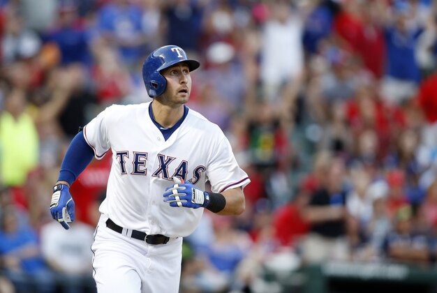 Jun 2, 2015; Arlington, TX, USA; Texas Rangers third baseman Joey Gallo (13) watches his two run home run in the third inning against the Chicago White Sox at Globe Life Park in Arlington. Mandatory Credit: Tim Heitman-USA TODAY Sports
