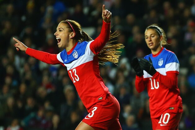 MILTON KEYNES, ENGLAND - FEBRUARY 13:  Alex Morgan of the United States (13) celebrates as she score their first goal during the Women's Friendly International match between England and USA at Stadium mk on February 13, 2015 in Milton Keynes, England.  (Photo by Richard Heathcote/Getty Images)