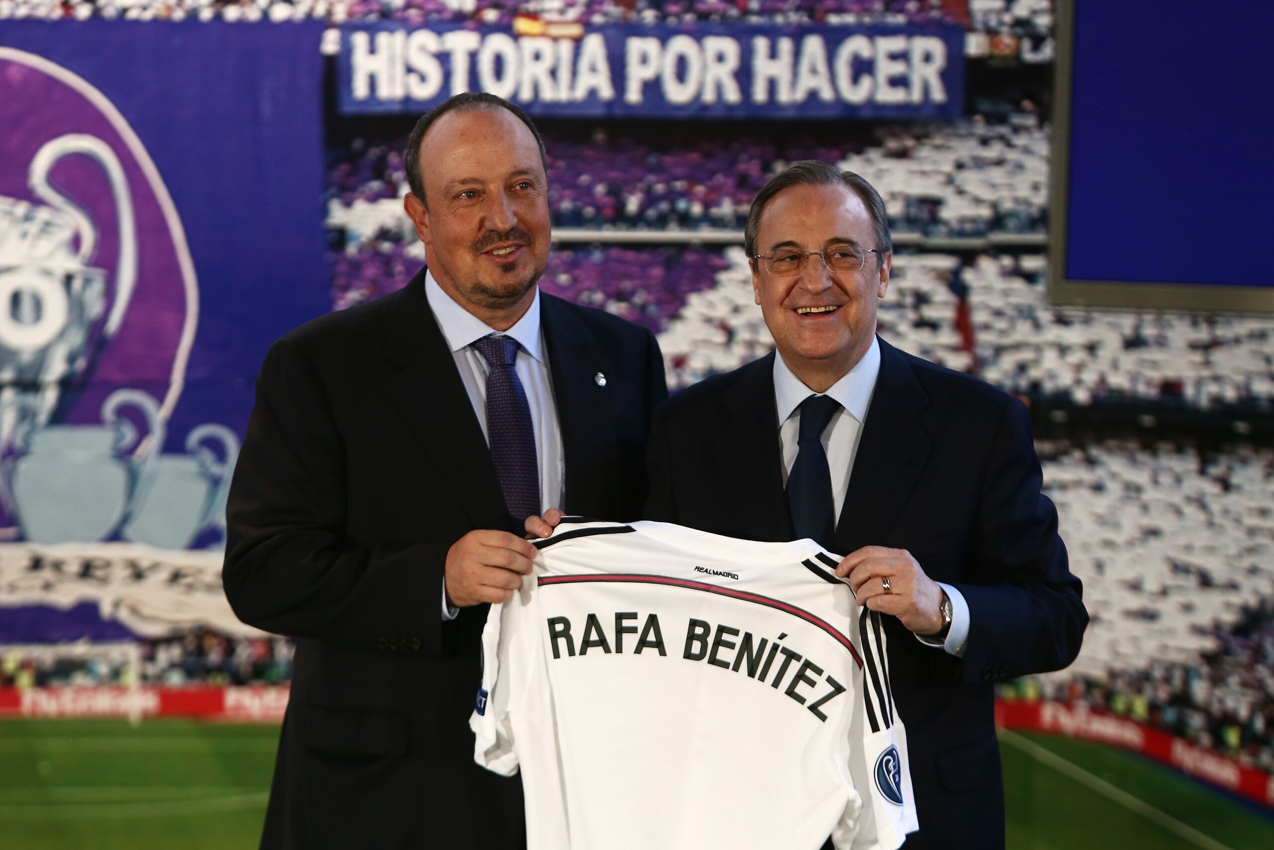 New Real Madrid coach Rafael Benitez, left, and Real Madrid's President Florentino Perez, right, pose for a picture during his official presentation at the Santiago Bernabeu stadium in Madrid, Spain, Wednesday, June 3, 2015, after signing for Real Madrid. (AP Photo/Andres Kudacki) New Real Madrid coach Rafael Benitez, left, and Real Madrid's President Florentino Perez, right, pose for a picture during his official presentation at the Santiago Bernabeu stadium in Madrid, Spain, Wednesday, June 3, 2015, after signing for Real Madrid. (AP Photo/Andres Kudacki)