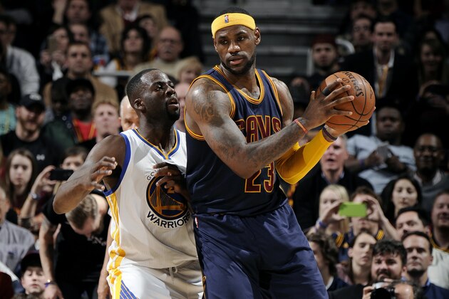 CLEVELAND, OH - FEBRUARY 26: LeBron James #23 of the Cleveland Cavaliers handles the ball against Draymond Green #23 of the Golden State Warriors at The Quicken Loans Arena on February 26, 2015 in Cleveland, Ohio. NOTE TO USER: User expressly acknowledges and agrees that, by downloading and/or using this Photograph, user is consenting to the terms and conditions of the Getty Images License Agreement. Mandatory Copyright Notice: Copyright 2015 NBAE (Photo by David Liam Kyle/NBAE via Getty Images) CLEVELAND, OH - FEBRUARY 26: LeBron James #23 of the Cleveland Cavaliers handles the ball against Draymond Green #23 of the Golden State Warriors at The Quicken Loans Arena on February 26, 2015 in Cleveland, Ohio. NOTE TO USER: User expressly acknowledges and agrees that, by downloading and/or using this Photograph, user is consenting to the terms and conditions of the Getty Images License Agreement. Mandatory Copyright Notice: Copyright 2015 NBAE (Photo by David Liam Kyle/NBAE via Getty Images)
