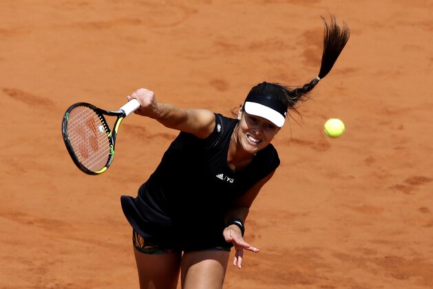 Serbia's Ana Ivanovic serves the ball to  Ukraine's Elina Svitolina during their quarterfinal match of the French Open tennis tournament at the Roland Garros stadium, Tuesday, June 2, 2015 in Paris. (AP Photo/Thibault Camus)