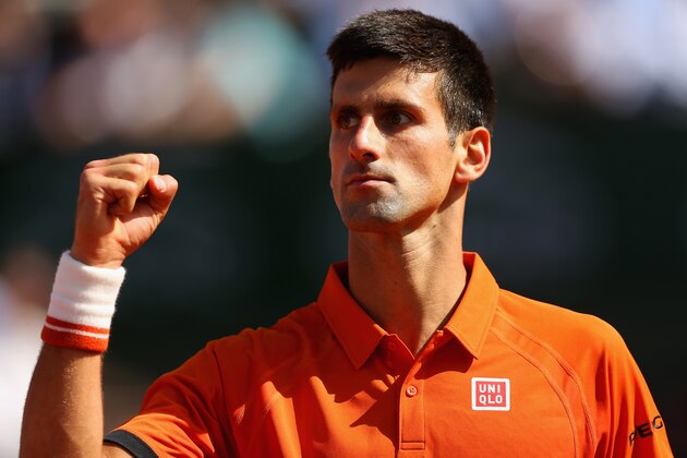 PARIS, FRANCE - JUNE 03:  Novak Djokovic of Serbia celebrates a point in his Men's quarter final match against Rafael Nadal of Spain on day eleven of the 2015 French Open at Roland Garros on June 3, 2015 in Paris, France.  (Photo by Clive Brunskill/Getty Images)