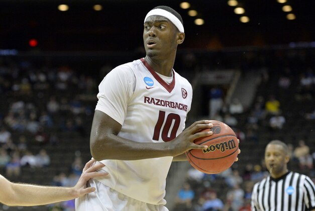 Mar 19, 2015; Jacksonville, FL, USA; Arkansas Razorbacks forward Bobby Portis (10) looks for an open teammate as Wofford Terriers forward C.J. Neumann (31) defends in the second half of a game in the second round of the 2015 NCAA Tournament at Jacksonville Veteran Memorial Arena. Mandatory Credit: Tommy Gilligan-USA TODAY Sports