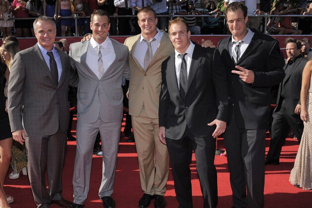 New England Patriots' Rob Gronkowski, center, is flanked by family members as he arrives at the ESPY Awards on Wednesday, July 11, 2012, in Los Angeles. (Photo by Chris Pizzello/Invision/AP) New England Patriots' Rob Gronkowski, center, is flanked by family members as he arrives at the ESPY Awards on Wednesday, July 11, 2012, in Los Angeles. (Photo by Chris Pizzello/Invision/AP)