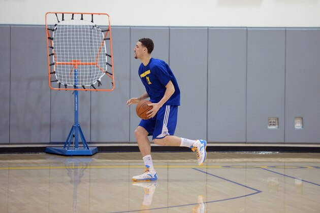 OAKLAND, CA - JUNE 1:  Klay Thompson #11 of the Golden State Warriors practices before the NBA Finals during the NBA Playoffs at the Warriors Training Center on June 1, 2015 in Oakland, California. NOTE TO USER: User expressly acknowledges and agrees that, by downloading and/or using this Photograph, user is consenting to the terms and conditions of the Getty Images License Agreement. Mandatory Copyright Notice: Copyright 2014 NBAE (Photo by Noah Graham/NBAE via Getty Images)