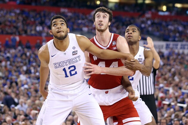 INDIANAPOLIS, IN - APRIL 04: Frank Kaminsky #44 of the Wisconsin Badgers battles for position on a against Karl-Anthony Towns #12 and Aaron Harrison #2 of the Kentucky Wildcats in the second half during the NCAA Men's Final Four Semifinal at Lucas Oil Stadium on April 4, 2015 in Indianapolis, Indiana.  (Photo by Streeter Lecka/Getty Images)
