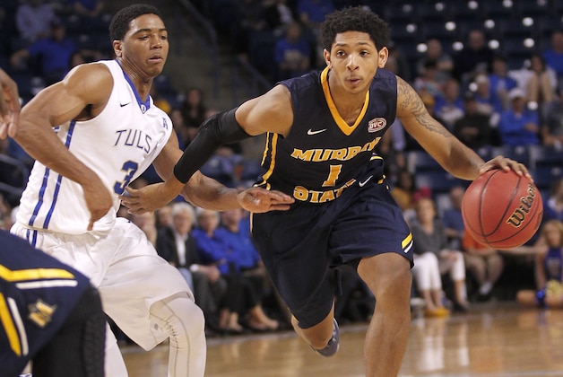 Murray State's Cameron Payne drives around Tulsa's Shaquille Harrison during the second half of an NCAA college basketball game in the National Invitation Tournament, Monday, March 23, 2015, in Tulsa, Okla. Murray State beat Tulsa 83-62. (AP Photo/Dave Crenshaw)