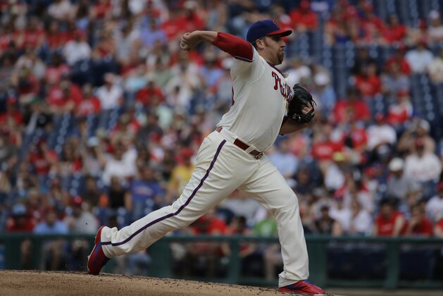 Philadelphia Phillies' Aaron Harang in action  during a baseball game against the Colorado Rockies, Saturday, May 30, 2015, in Philadelphia. (AP Photo/Matt Slocum)