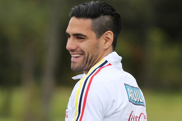 Colombia's soccer player Radamel Falcao Garcia smiles after a press conference in Bogota, Colombia, Friday, May 29, 2015. Colombia's national team members are departing for Argentina where they'll train for the Copa America which starts in June in neighboring Chile. (AP Photo/Fernando Vergara)