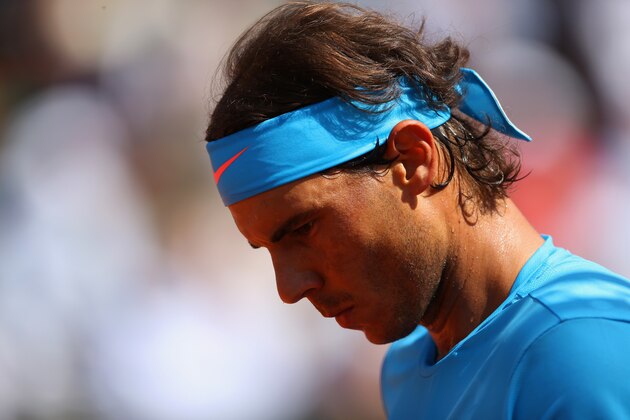 PARIS, FRANCE - JUNE 03:  Rafael Nadal of Spain looks on in his Men's quarter final match against Novak Djokovic of Serbia on day eleven of the 2015 French Open at Roland Garros on June 3, 2015 in Paris, France.  (Photo by Clive Brunskill/Getty Images)