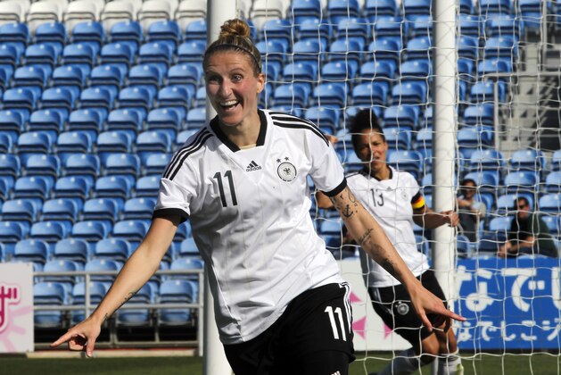 Germany's Anja Mittag celebrates after scoring her side's second goal during the women's soccer Algarve Cup final match between Germany and Japan at the Algarve stadium, outside Faro, southern Portugal, Wednesday, March 12, 2014. Mittag scored once in Germany's 3-0 victory. (AP Photo/Francisco Seco)