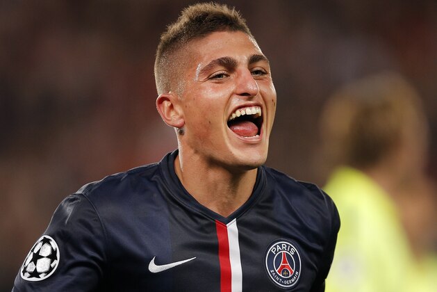 PSG's Marco Verratti celebrates after scoring his side's second goal during the Champions League soccer match between PSG and Barcelona, at the Parc des Princes stadium, in Paris, Tuesday, Sept. 30, 2014. (AP Photo/Christophe Ena)