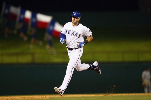 ARLINGTON, TX - JUNE 03:  Joey Gallo #13 of the Texas Rangers runs the bases after hitting a homerun against the Chicago White Sox in the ninth inning at Globe Life Park in Arlington on June 3, 2015 in Arlington, Texas.  (Photo by Ronald Martinez/Getty Images)