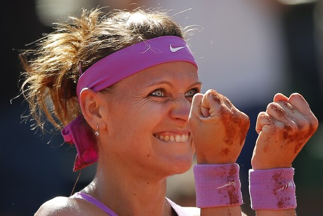 Lucie Safarova of the Czech Republic celebrates winning her semifinal match of the French Open tennis tournament against Serbia's Ana Ivanovic in two sets, 7-5, 7-5, at the Roland Garros stadium, in Paris, France, Thursday, June 4, 2015. (AP Photo/Francois Mori)