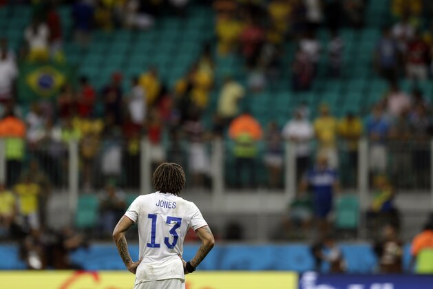 United States' Jermaine Jones stares into the spectator seating area after Belgium defeated the USA 2-1 in extra time to advance to the quarterfinals during the World Cup round of 16 soccer match between Belgium and the USA at the Arena Fonte Nova in Salvador, Brazil, Tuesday, July 1, 2014. (AP Photo/Natacha Pisarenko)