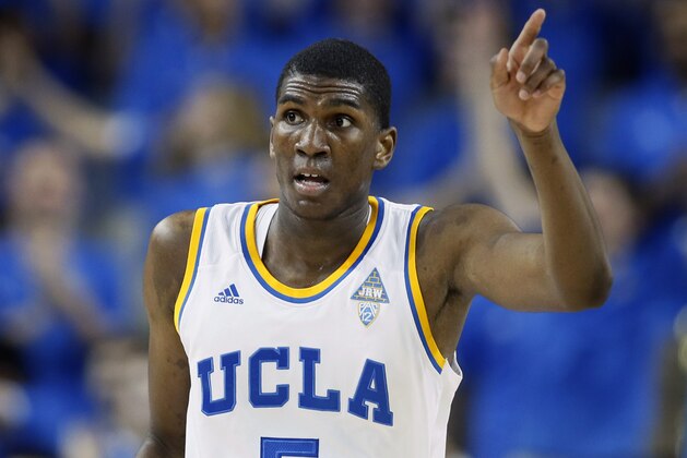 UCLA's Kevon Looney celebrates after dunking the ball against Oregon State during the first half of an NCAA college basketball game Wednesday, Feb. 11, 2015, in Los Angeles. (AP Photo/Danny Moloshok)