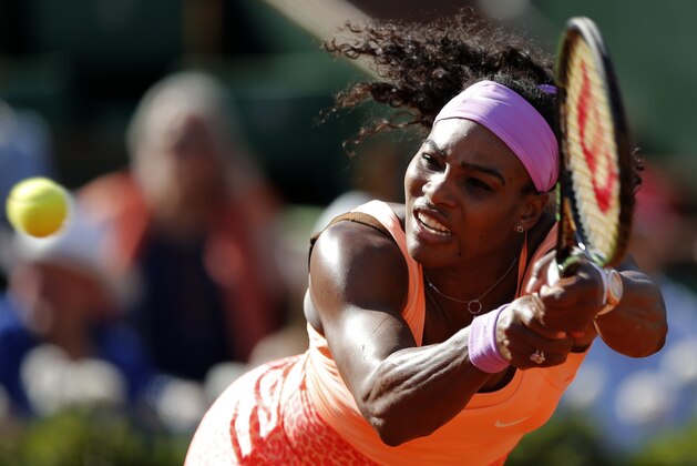 Serena Williams of the U.S. returns in her semifinal match of the French Open tennis tournament against Timea Bacsinszky of Switzerland at the Roland Garros stadium, in Paris, France, Thursday, June 4, 2015. (AP Photo/Francois Mori)