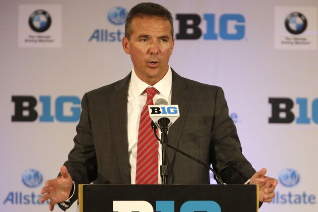 Ohio State head football coach Urban Meyer speaks at a news conference during the NCAA Big Ten football media day meetings on Wednesday, July 24, 2013, in Chicago. (AP Photo/M. Spencer Green)