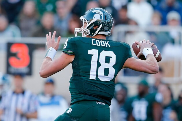 EAST LANSING, MI - OCTOBER 25: Quarterback Connor Cook #18 of the Michigan State Spartans drops back to pass during the third quarter of the game against the Michigan Wolverines at Spartan Stadium on October 25 , 2014 in East Lansing, Michigan. The Spartans defeated the Wolverines 35-11. (Photo by Leon Halip/Getty Images)