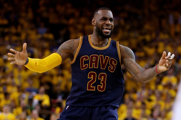 OAKLAND, CA - JUNE 04:  LeBron James #23 of the Cleveland Cavaliers reacts in the second half against the Golden State Warriors during Game One of the 2015 NBA Finals at ORACLE Arena on June 4, 2015 in Oakland, California. NOTE TO USER: User expressly acknowledges and agrees that, by downloading and or using this photograph, user is consenting to the terms and conditions of Getty Images License Agreement.  (Photo by Ezra Shaw/Getty Images)
