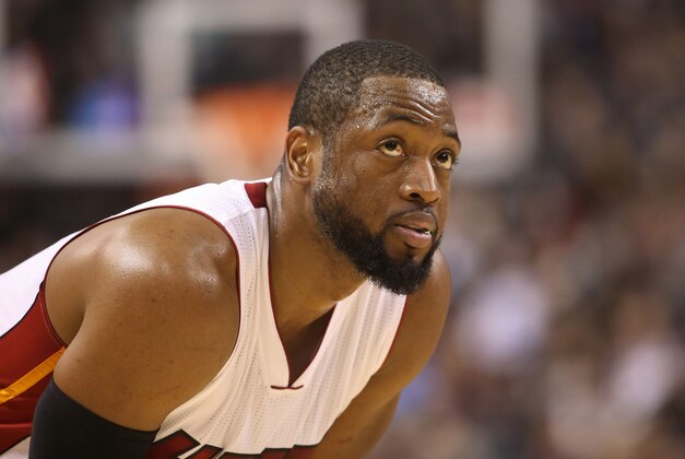Mar 13, 2015; Toronto, Ontario, CAN; Miami Heat shooting guard Dwyane Wade (3) looks on against the Toronto Raptors at Air Canada Centre. The Raptors beat the Heat 102-92. Mandatory Credit: Tom Szczerbowski-USA TODAY Sports