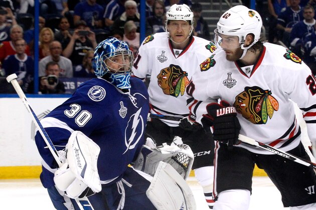TAMPA, FL - JUNE 03:  Ben Bishop #30 of the Tampa Bay Lightning tends goal against Brandon Saad #20 of the Chicago Blackhawks during Game One of the 2015 NHL Stanley Cup Final at Amalie Arena on June 3, 2015 in Tampa, Florida.  (Photo by Scott Iskowitz/Getty Images)