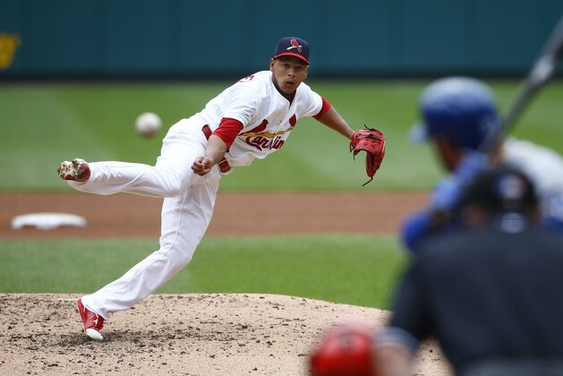 St. Louis Cardinals starting pitcher Carlos Martinez throws to a Los Angeles Dodgers batter during the fourth inning of a baseball game Sunday, May 31, 2015, in St. Louis. (AP Photo/Billy Hurst)