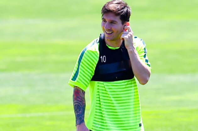 BARCELONA, SPAIN - JUNE 02:  Lionel Messi of FC Barcelona leaves the pitch during a FC Barcelona open Media Day ahead of their UEFA Champions League Final against Juventus on June 2, 2015 in Barcelona, Spain.  (Photo by David Ramos/Getty Images)