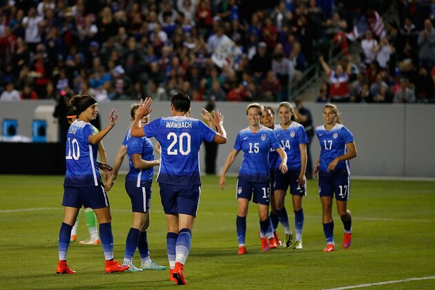 LOS ANGELES, CA - MAY 17:  Forward Abby Wambach #20 of USA celebrates with her teammates after scoring a goal in the second half against Mexico during their international friendly match at StubHub Center on May 17, 2015 in Los Angeles, California.  (Photo by Joe Scarnici/Getty Images)