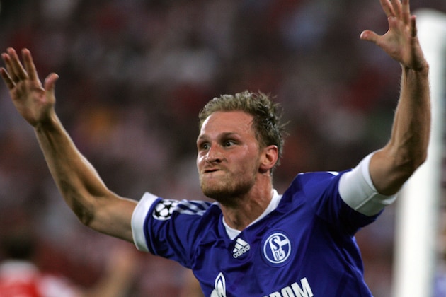 ATHENS, GREECE - SEPTEMBER 18: Benedikt Howede of Schalke 04 FC celebrates a goal during the UEFA Champions League  first leg match between Olympiacos  and Schalke 04 at the Karaiskakis Stadium on September 18, 2012 in Athens, Greece. (Photo by Milos Bicanski/Getty Images)