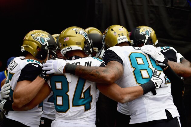 BALTIMORE, MD - DECEMBER 14: Wide receiver Cecil Shorts #84 of the Jacksonville Jaguars and teammates huddle before a game against the Jacksonville Jaguars at M&T Bank Stadium on December 14, 2014 in Baltimore, Maryland.  (Photo by Patrick Smith/Getty Images)
