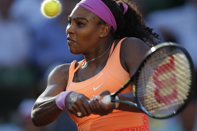 Serena Williams of the U.S. returns in her semifinal match of the French Open tennis tournament against Timea Bacsinszky of Switzerland at the Roland Garros stadium, in Paris, France, Thursday, June 4, 2015. Williams won in three sets 4-6, 6-3, 6-0. (AP Photo/Francois Mori)