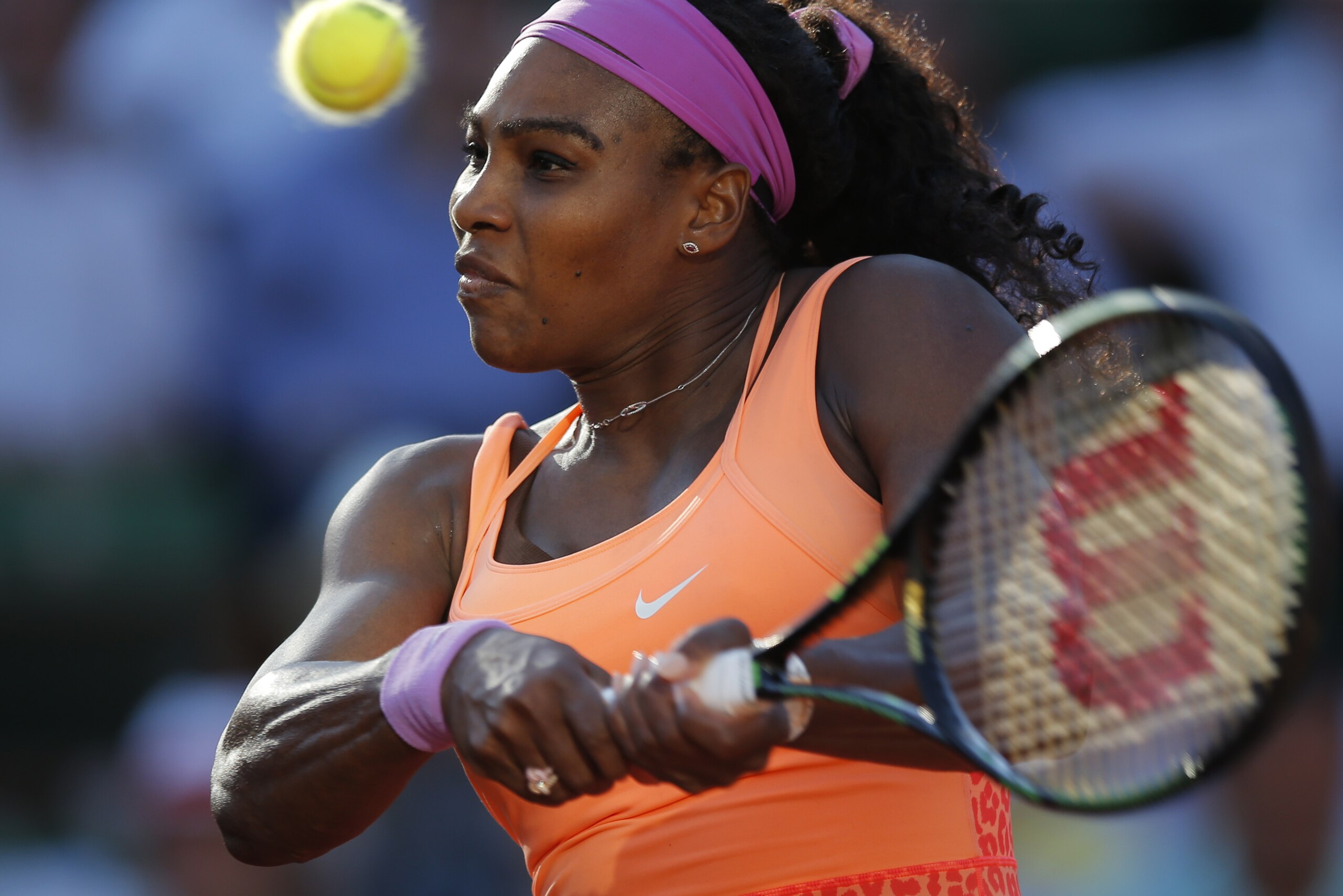 Serena Williams of the U.S. returns in her semifinal match of the French Open tennis tournament against Timea Bacsinszky of Switzerland at the Roland Garros stadium, in Paris, France, Thursday, June 4, 2015. Williams won in three sets 4-6, 6-3, 6-0. (AP Photo/Francois Mori)