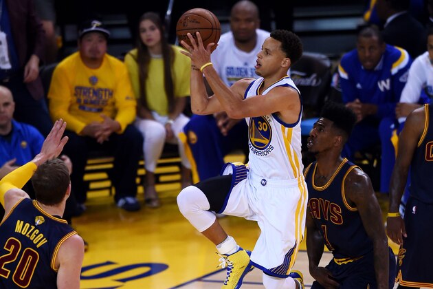 OAKLAND, CA - JUNE 04:  Stephen Curry #30 of the Golden State Warriors shoots against the Cleveland Cavaliers during Game One of the 2015 NBA Finals at ORACLE Arena on June 4, 2015 in Oakland, California. NOTE TO USER: User expressly acknowledges and agrees that, by downloading and or using this photograph, user is consenting to the terms and conditions of Getty Images License Agreement.  (Photo by Thearon W. Henderson/Getty Images)