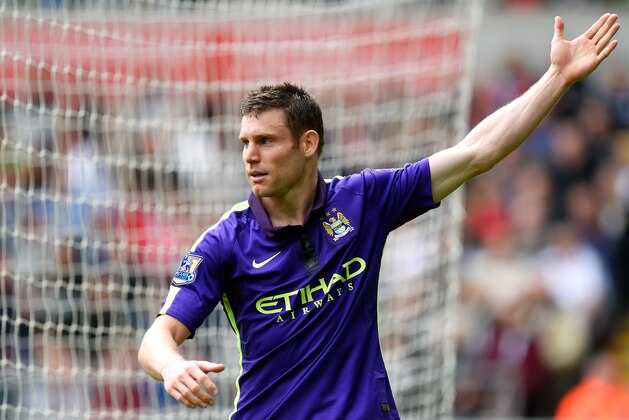 SWANSEA, WALES - MAY 17:  James Milner of Manchester City celebrates after scoring his team's second goal during the Barclays Premier League match between Swansea and Manchester City at the Liberty Stadium on May 17, 2015 in Swansea, Wales.  (Photo by Stu Forster/Getty Images)