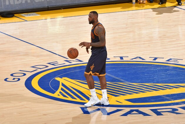 OAKLAND,CA - JUNE 4:  LeBron James #23 of the Cleveland Cavaliers dribbles up the court against the Golden State Warriors at the Oracle Arena During Game one of the 2015 NBA Finals on June 4, 2015 in Oakland,California NOTE TO USER: User expressly acknowledges and agrees that, by downloading and/or using this Photograph, user is consenting to the terms and conditions of the Getty Images License Agreement. Mandatory Copyright Notice: Copyright 2015 NBAE (Photo by Jesse D. Garrabrant/NBAE via Getty Images)