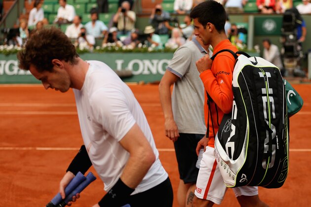 PARIS, FRANCE - JUNE 05:  Bad weather stops play in the fourth set of the Men's Semi Final match between Andy Murray of Great Britain and Novak Djokovic of Serbia on day thirteen of the 2015 French Open at Roland Garros on June 5, 2015 in Paris, France.  (Photo by Clive Brunskill/Getty Images)