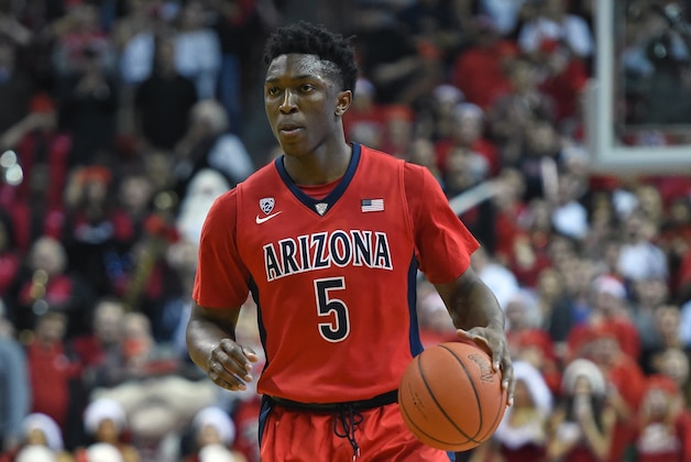 LAS VEGAS, NV - DECEMBER 23:  Stanley Johnson #5 of the Arizona Wildcats brings the ball up the court against the UNLV Rebels during their game at the Thomas & Mack Center on December 23, 2014 in Las Vegas, Nevada. UNLV won 71-67.  (Photo by Ethan Miller/Getty Images)