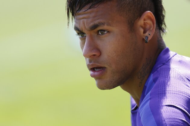 FC Barcelona's Neymar looks on during a training session at the Sports Center FC Barcelona Joan Gamper in San Joan Despi, Spain, Friday, May 29, 2015.  FC Barcelona will play against Athletic Bilbao in the Spanish Copa del Rey soccer final on Saturday May 30. (AP Photo/Manu Fernandez)