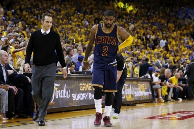 Cavaliers guard Kyrie Irving exits Game 1 with a knee injury
