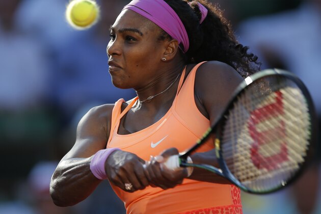 Serena Williams of the U.S. returns in her semifinal match of the French Open tennis tournament against Timea Bacsinszky of Switzerland at the Roland Garros stadium, in Paris, France, Thursday, June 4, 2015. Williams won in three sets 4-6, 6-3, 6-0. (AP Photo/Francois Mori)