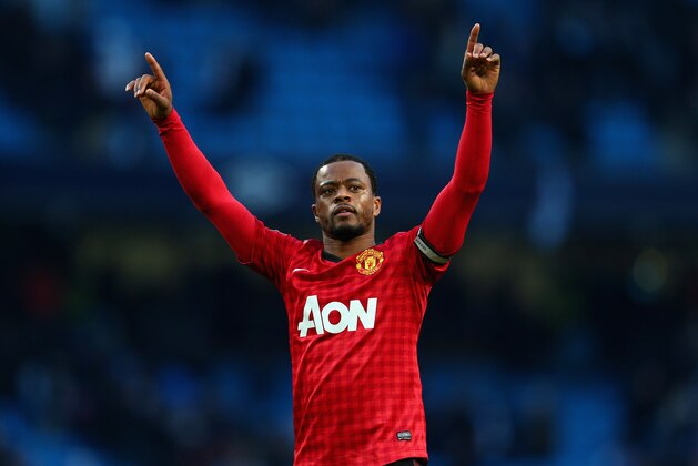 MANCHESTER, ENGLAND - DECEMBER 09:  Patrice Evra of Manchester United celebrates at the end of the Barclays Premier League match between Manchester City and Manchester United at the Etihad Stadium on December 9, 2012 in Manchester, England.  (Photo by Clive Mason/Getty Images)